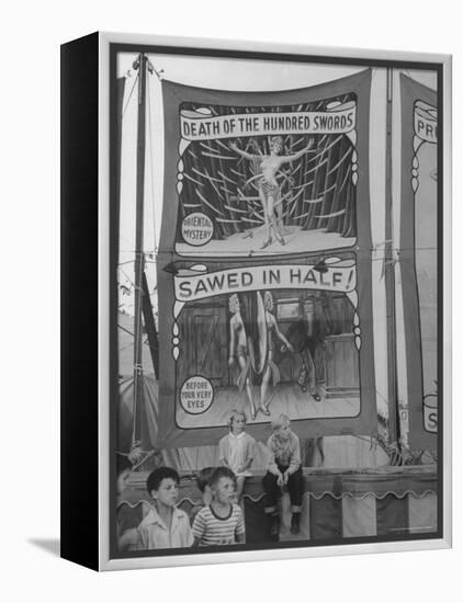 Children Sitting in Front of Banners for Magic Show Being Performed by Orson Welles-Peter Stackpole-Framed Premier Image Canvas