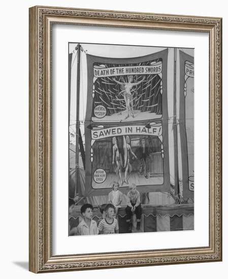 Children Sitting in Front of Banners for Magic Show Being Performed by Orson Welles-Peter Stackpole-Framed Photographic Print