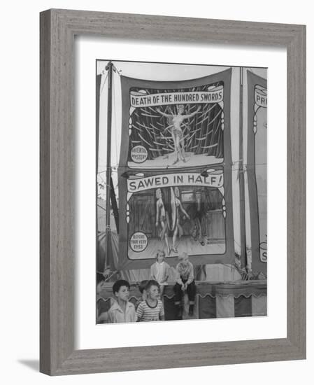 Children Sitting in Front of Banners for Magic Show Being Performed by Orson Welles-Peter Stackpole-Framed Photographic Print