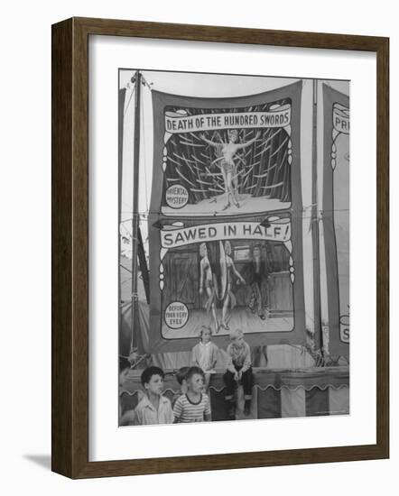 Children Sitting in Front of Banners for Magic Show Being Performed by Orson Welles-Peter Stackpole-Framed Photographic Print