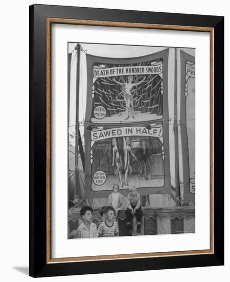 Children Sitting in Front of Banners for Magic Show Being Performed by Orson Welles-Peter Stackpole-Framed Photographic Print