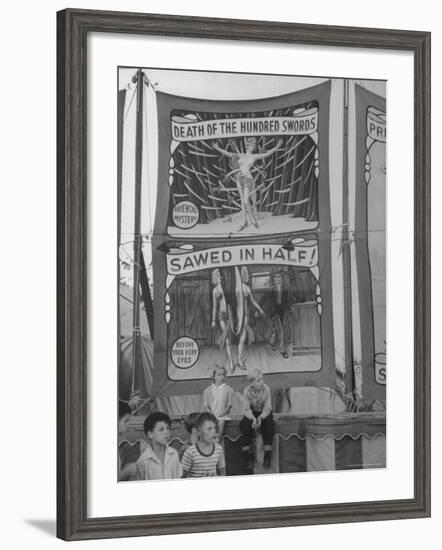 Children Sitting in Front of Banners for Magic Show Being Performed by Orson Welles-Peter Stackpole-Framed Photographic Print