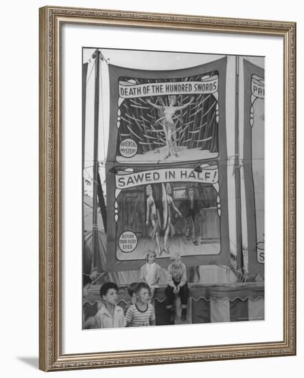 Children Sitting in Front of Banners for Magic Show Being Performed by Orson Welles-Peter Stackpole-Framed Photographic Print