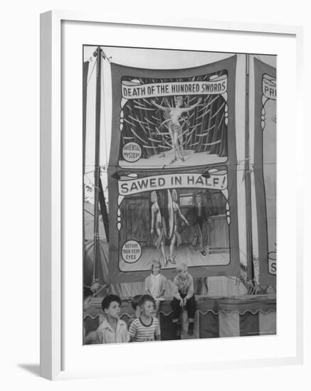 Children Sitting in Front of Banners for Magic Show Being Performed by Orson Welles-Peter Stackpole-Framed Photographic Print