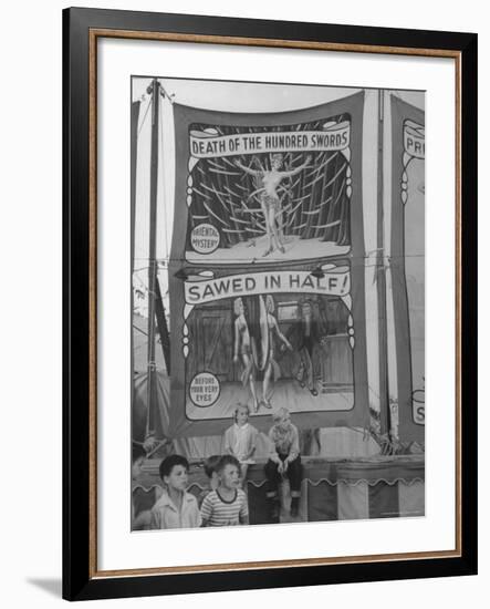 Children Sitting in Front of Banners for Magic Show Being Performed by Orson Welles-Peter Stackpole-Framed Photographic Print