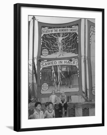 Children Sitting in Front of Banners for Magic Show Being Performed by Orson Welles-Peter Stackpole-Framed Photographic Print