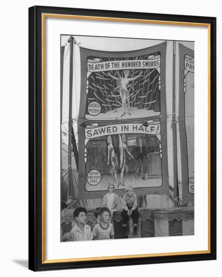 Children Sitting in Front of Banners for Magic Show Being Performed by Orson Welles-Peter Stackpole-Framed Photographic Print