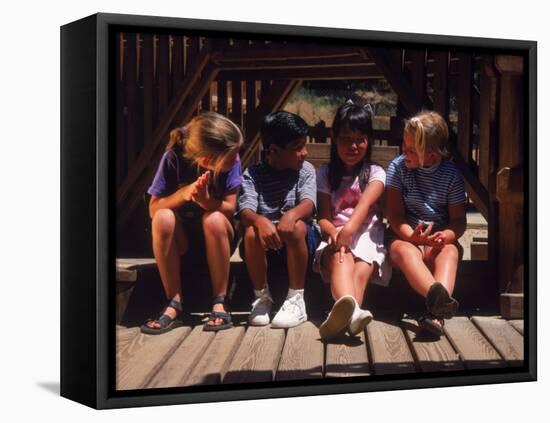 Children Sitting in Playground-Mark Gibson-Framed Premier Image Canvas