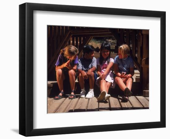 Children Sitting in Playground-Mark Gibson-Framed Photographic Print