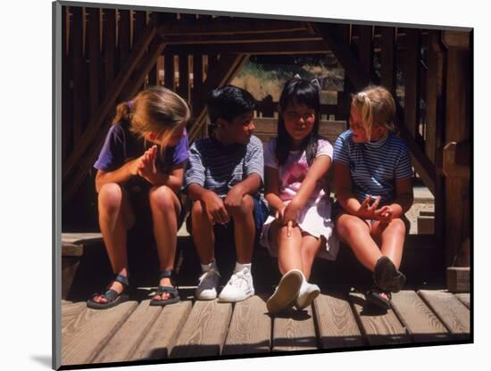 Children Sitting in Playground-Mark Gibson-Mounted Photographic Print