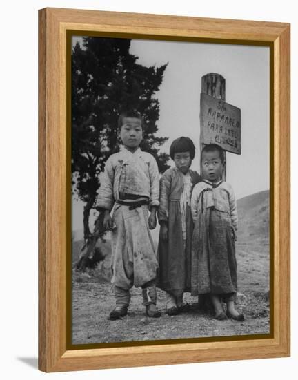 Children Standing in Front of Boundary Zone Sign Written in Russian, English, and Korean-John Florea-Framed Premier Image Canvas