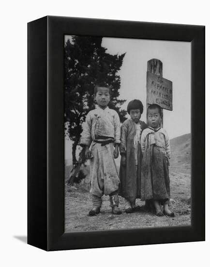 Children Standing in Front of Boundary Zone Sign Written in Russian, English, and Korean-John Florea-Framed Premier Image Canvas
