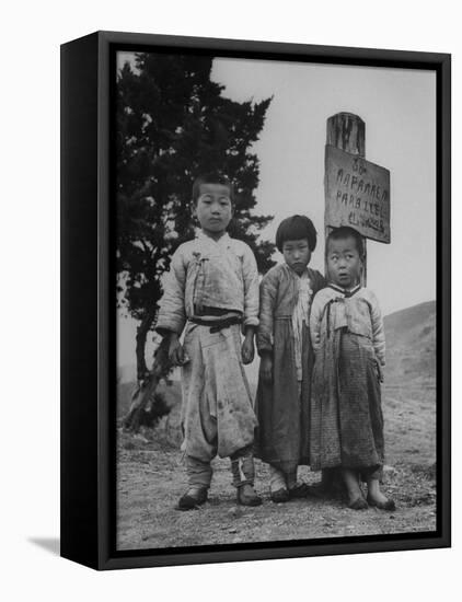 Children Standing in Front of Boundary Zone Sign Written in Russian, English, and Korean-John Florea-Framed Premier Image Canvas