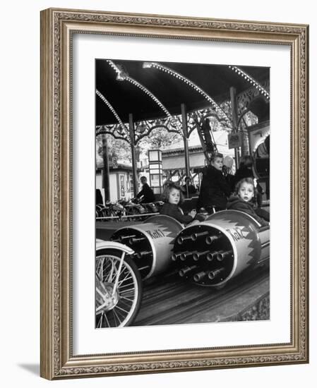 Children Waiting Expectantly For a "Rocket Ride" on the Carousel-Nina Leen-Framed Photographic Print