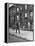 Children Watching a Policeman Walk His Beat in Front of Apartment Buildings-Ed Clark-Framed Premier Image Canvas