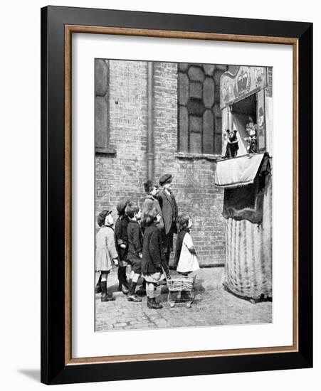 Children Watching a Punch and Judy Show in a London Street, 1936-Donald Mcleish-Framed Giclee Print