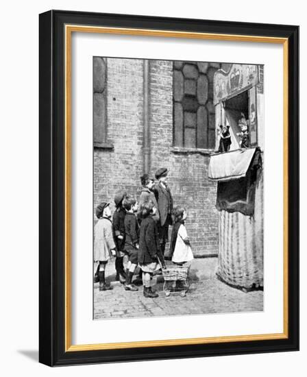 Children Watching a Punch and Judy Show in a London Street, 1936-Donald Mcleish-Framed Giclee Print