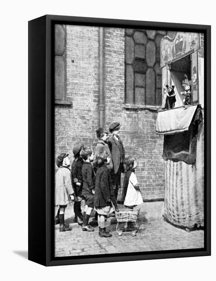 Children Watching a Punch and Judy Show in a London Street, 1936-Donald Mcleish-Framed Premier Image Canvas