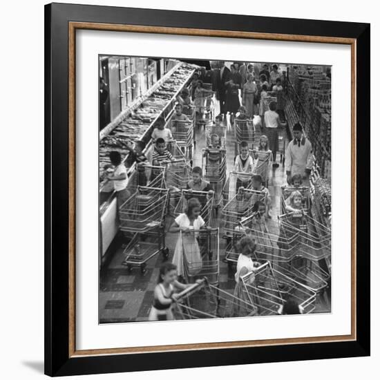 Children with Shopping Carts Let Loose in Supermarket During Experiment by Kroger Food Foundation-Francis Miller-Framed Photographic Print