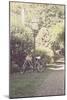 Childs Bike Against Lampost-Jillian Melnyk-Mounted Photographic Print