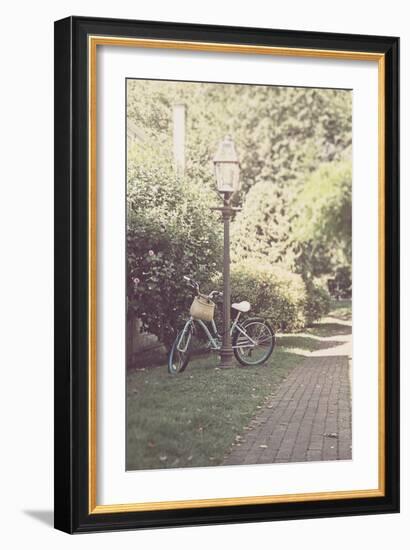 Childs Bike Against Lampost-Jillian Melnyk-Framed Photographic Print