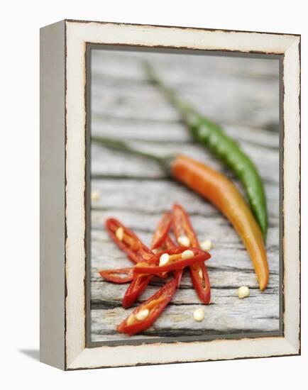 Chili Peppers, Whole and Sliced-Winfried Heinze-Framed Premier Image Canvas