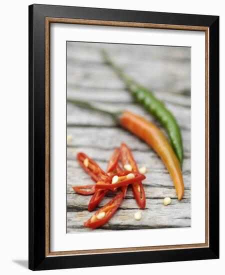 Chili Peppers, Whole and Sliced-Winfried Heinze-Framed Photographic Print