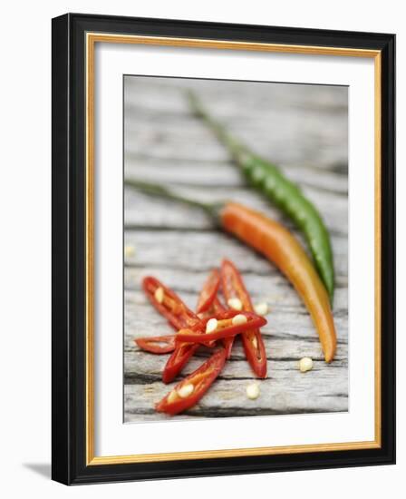 Chili Peppers, Whole and Sliced-Winfried Heinze-Framed Photographic Print