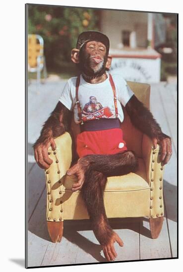 Chimp Sitting in Armchair-null-Mounted Art Print