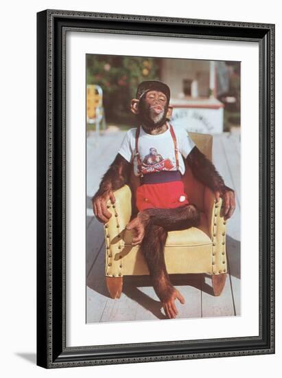 Chimp Sitting in Armchair-null-Framed Art Print