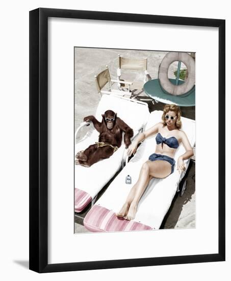 Chimpanzee and a Woman Sunbathing-null-Framed Photo