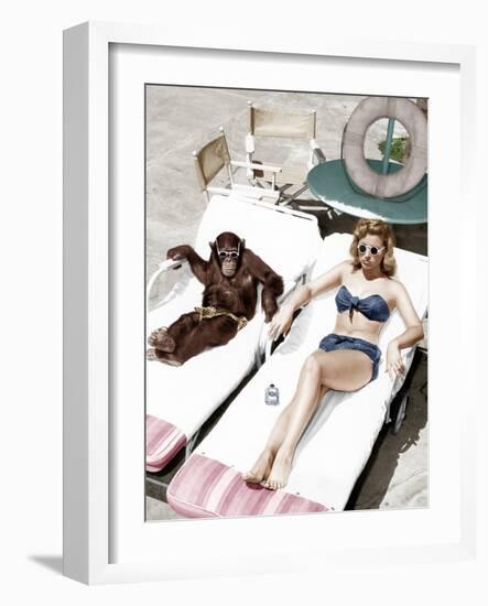 Chimpanzee and a Woman Sunbathing-null-Framed Photo