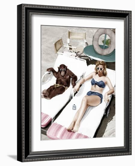 Chimpanzee and a Woman Sunbathing-null-Framed Photo