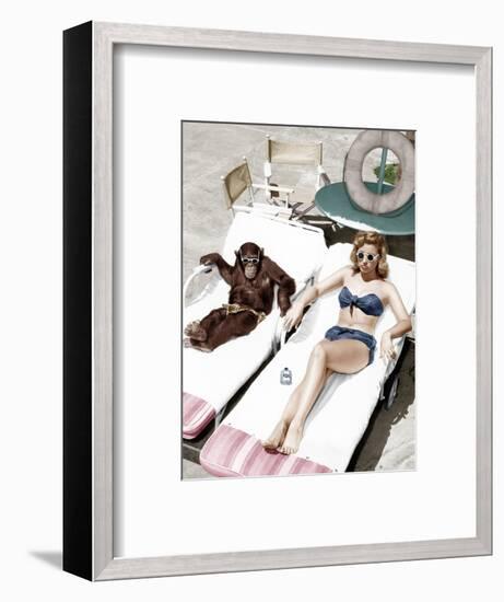 Chimpanzee and a Woman Sunbathing-null-Framed Photo