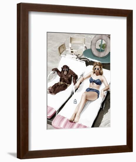 Chimpanzee and a Woman Sunbathing-null-Framed Photo