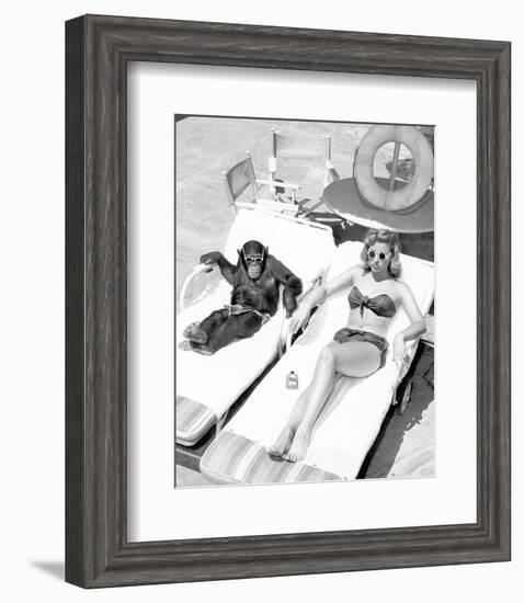 Chimpanzee & Woman Sunbathing-null-Framed Art Print