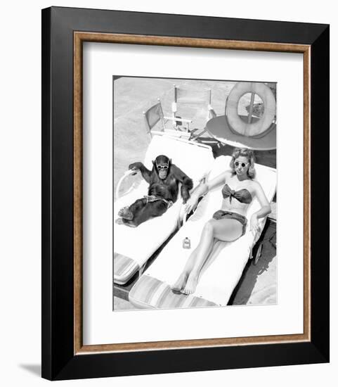 Chimpanzee & Woman Sunbathing-null-Framed Art Print