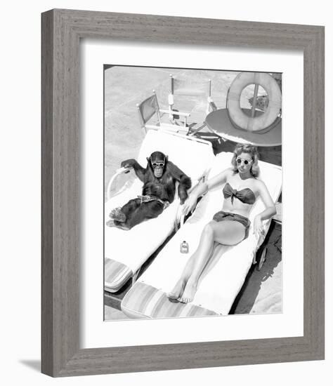 Chimpanzee & Woman Sunbathing-null-Framed Art Print