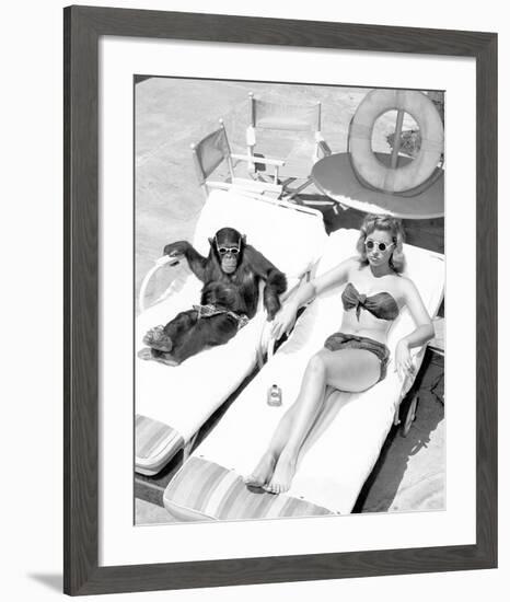 Chimpanzee & Woman Sunbathing--Framed Art Print