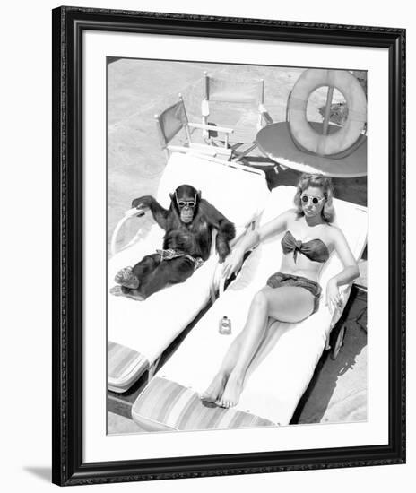 Chimpanzee & Woman Sunbathing-null-Framed Art Print