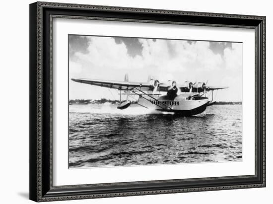 China Clipper flying out of Miami, Fl Photograph - Miami, FL-Lantern Press-Framed Art Print