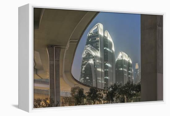 China, Jiangsu, Nanjing. Expressway and modern buildings near Nanjing South Station.-Rob Tilley-Framed Premier Image Canvas