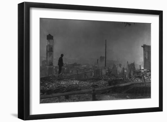 Chinese-American Man Against the Ruins of San Francisco's Chinatown. April 1906-null-Framed Photo