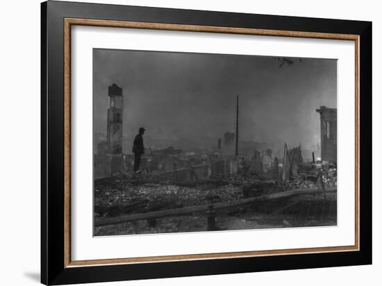 Chinese-American Man Against the Ruins of San Francisco's Chinatown. April 1906-null-Framed Photo