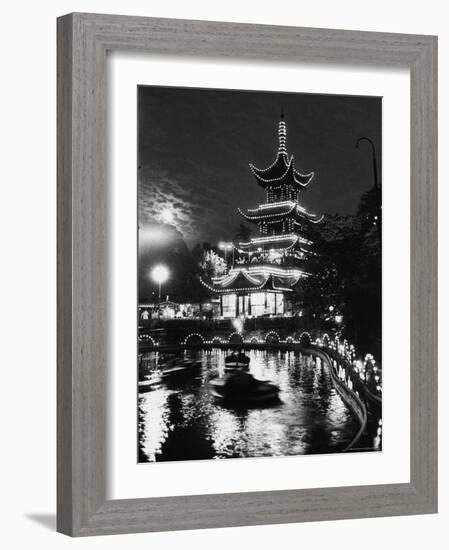 Chinese Styled Tower Viewed from Across an Ornamental Lake at Night in the Tivoli Amusement Park-Carl Mydans-Framed Photographic Print