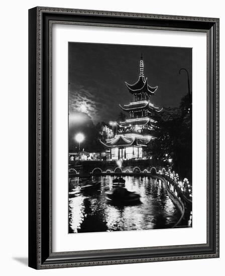 Chinese Styled Tower Viewed from Across an Ornamental Lake at Night in the Tivoli Amusement Park-Carl Mydans-Framed Photographic Print