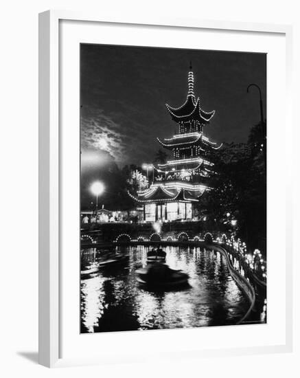 Chinese Styled Tower Viewed from Across an Ornamental Lake at Night in the Tivoli Amusement Park-Carl Mydans-Framed Photographic Print