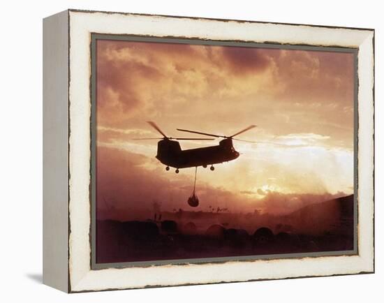 Chinook Helicopter Lifts Ammunition-null-Framed Premier Image Canvas