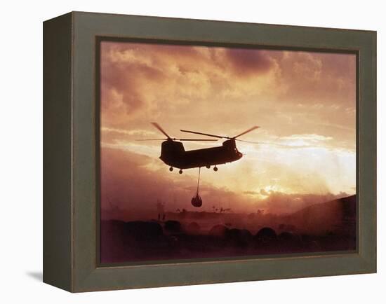 Chinook Helicopter Lifts Ammunition-null-Framed Premier Image Canvas