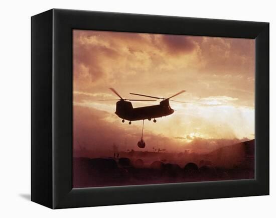 Chinook Helicopter Lifts Ammunition-null-Framed Premier Image Canvas